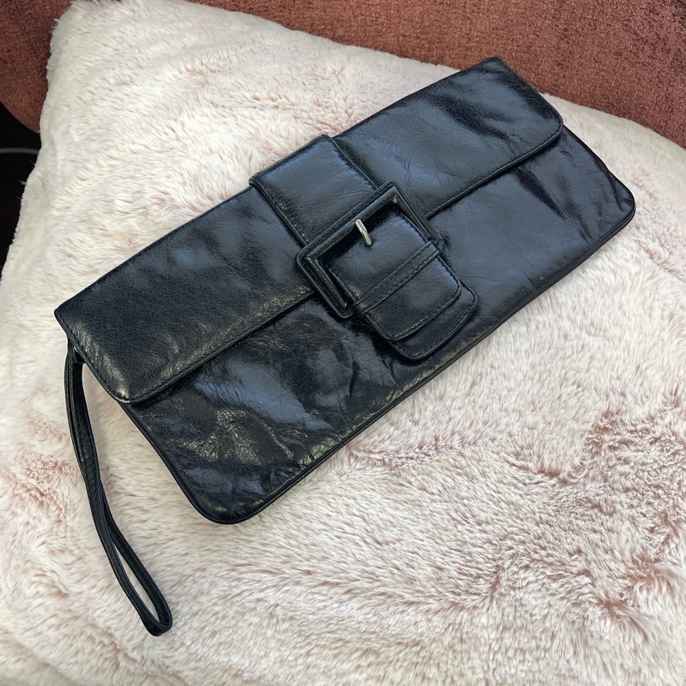 Boho black leather clutch.